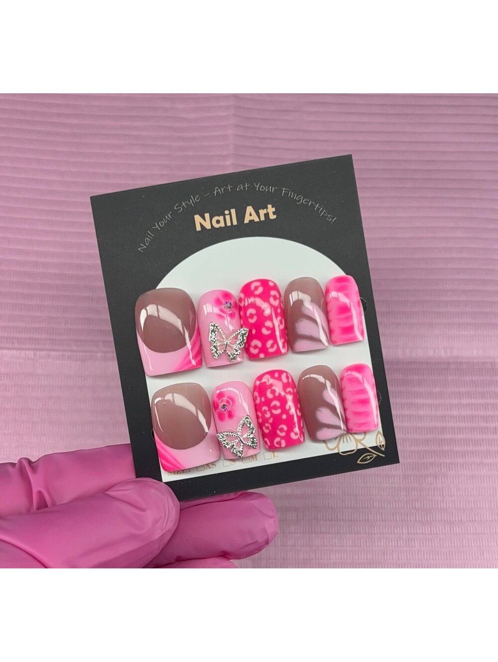 Short square press on nails light pink French tips hot pink butterfly charms
